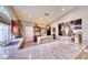 Bright, updated kitchen with stainless appliances, island, and stone countertops at 7311 Chaparral Cove Ln, Las Vegas, NV 89131