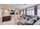 Living room with hardwood floors, fireplace, and lots of natural light at 7311 Chaparral Cove Ln, Las Vegas, NV 89131