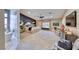Luxurious main bedroom boasts stylish decor, plush carpet, and ensuite bathroom with tub at 7311 Chaparral Cove Ln, Las Vegas, NV 89131