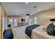 Bright main bedroom provides access to the backyard and includes a well-appointed ensuite bathroom at 7311 Chaparral Cove Ln, Las Vegas, NV 89131
