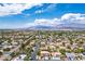 Overhead view of a suburban neighborhood with mountains in the distance at 7340 Elderly Ave, Las Vegas, NV 89131