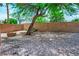 Backyard featuring a gravel area with a tree and swing at 7340 Elderly Ave, Las Vegas, NV 89131
