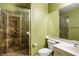 Bathroom featuring a stand up shower with unique design, toilet and sink at 7340 Elderly Ave, Las Vegas, NV 89131