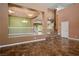 Spacious living room with gleaming tile floors, grand pillars, and a staircase with marble steps at 7340 Elderly Ave, Las Vegas, NV 89131