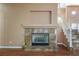 Close up of the fireplace featuring marble surround and hearth with decorative accents at 7340 Elderly Ave, Las Vegas, NV 89131