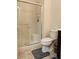 Bathroom features a glass enclosed shower and dark cabinets at 777 Star Apple Ln, Las Vegas, NV 89178