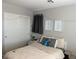Inviting bedroom with closet, decorative string lights, and serene decor at 777 Star Apple Ln, Las Vegas, NV 89178