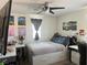 Bright bedroom with modern decor, dual workstations, and natural light at 777 Star Apple Ln, Las Vegas, NV 89178