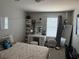 Bright bedroom with vanity, shelving, and comfortable furnishings at 777 Star Apple Ln, Las Vegas, NV 89178