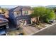 Beautiful home with tile roof, brick driveway, mature landscaping, and mountain views at 777 Star Apple Ln, Las Vegas, NV 89178