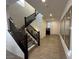 Foyer with staircase, tile flooring, and mirrors at 777 Star Apple Ln, Las Vegas, NV 89178