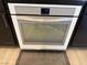 Modern oven in kitchen with electronic controls, gray trim, and clean interior for cooking needs at 777 Star Apple Ln, Las Vegas, NV 89178