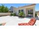 Inviting backyard patio with outdoor seating and lush landscaping at 8312 Raphael Ct, Las Vegas, NV 89129