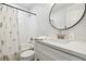 Well-lit bathroom featuring a shower-tub combination and modern vanity at 8312 Raphael Ct, Las Vegas, NV 89129