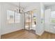 Dining area featuring sliding glass doors to the backyard and modern lighting at 8312 Raphael Ct, Las Vegas, NV 89129