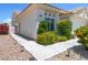 Charming home with well-maintained front yard and beautiful landscaping at 8312 Raphael Ct, Las Vegas, NV 89129