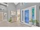Bright entryway with wood floors, modern decor, and a glimpse of the kitchen at 8370 Plum Creek Ct, Las Vegas, NV 89113