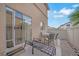Backyard featuring a patio with outdoor seating and desert landscaping at 9053 Starling Wing Pl, Las Vegas, NV 89143