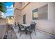 Cozy backyard patio featuring a table with four chairs at 9053 Starling Wing Pl, Las Vegas, NV 89143