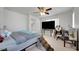 Neutral bedroom features plush carpeting, ceiling fan, and a walk-in closet at 9053 Starling Wing Pl, Las Vegas, NV 89143