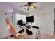 Bright bedroom with desk and ceiling fan at 9053 Starling Wing Pl, Las Vegas, NV 89143