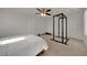 Spacious bedroom featuring a ceiling fan, closet, and carpeted floors at 9053 Starling Wing Pl, Las Vegas, NV 89143