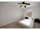 Bedroom featuring a ceiling fan, neutral walls, and carpeted floors at 9053 Starling Wing Pl, Las Vegas, NV 89143