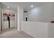 Upstairs hallway with bright natural light and convenient laundry area at 9053 Starling Wing Pl, Las Vegas, NV 89143