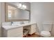This bathroom features a double vanity with modern fixtures and a neutral color scheme at 925 Alan Shepard St, Las Vegas, NV 89145