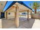 Covered carport featuring brick columns, offering ample parking and protection from the elements at 925 Alan Shepard St, Las Vegas, NV 89145