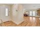 Inviting entryway showcasing hardwood floors and views into the living and dining area at 925 Alan Shepard St, Las Vegas, NV 89145