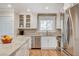 Well-lit kitchen with stainless steel appliances, granite countertops, and modern fixtures at 925 Alan Shepard St, Las Vegas, NV 89145