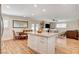 Spacious kitchen with island seating, stainless steel appliances, and open layout at 925 Alan Shepard St, Las Vegas, NV 89145