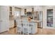 Kitchen with island seating, stainless steel appliances, and access to pantry at 925 Alan Shepard St, Las Vegas, NV 89145