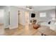 Comfortable living space featuring a bed, breakfast table and kitchenette, with walk-in closet at 925 Alan Shepard St, Las Vegas, NV 89145