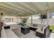 The covered patio is great for outdoor living with comfortable seating and an outdoor dining area at 925 Alan Shepard St, Las Vegas, NV 89145