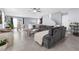 Bright and open living room with tile flooring and modern decor at 9730 Cluny Ave, Las Vegas, NV 89178