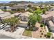 Aerial view of a charming home with well-maintained landscaping in a peaceful neighborhood at 981 Leadville Meadows Dr, Henderson, NV 89052