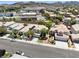 Community view showcasing well-maintained homes in a suburban setting with mountain views at 981 Leadville Meadows Dr, Henderson, NV 89052