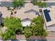 Aerial view of the home featuring mature landscaping and neutral color scheme at 981 Leadville Meadows Dr, Henderson, NV 89052