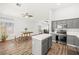 Kitchen with an island, dining table, stainless steel appliances and an open layout at 981 Leadville Meadows Dr, Henderson, NV 89052