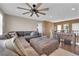 Inviting living room featuring a comfortable sectional sofa and hardwood floors at 9906 Stiges St, Las Vegas, NV 89178