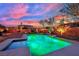 Beautiful backyard with pool, lush greenery, and a basketball hoop, perfect for entertaining at 9906 Stiges St, Las Vegas, NV 89178