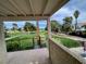 Balcony showcasing a serene view of a lush green golf course surrounded by mature trees at 1006 Bel Air Cir, Las Vegas, NV 89109
