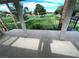 Relaxing balcony view overlooking the lush green golf course and mature trees at 1006 Bel Air Cir, Las Vegas, NV 89109