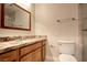 Well-maintained bathroom featuring a vanity with granite counters and neutral colors at 1006 Bel Air Cir, Las Vegas, NV 89109
