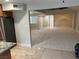 Open-concept living area visible from the kitchen with lots of light at 1006 Bel Air Cir, Las Vegas, NV 89109