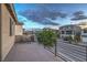 Relaxing balcony view with iron railing and a charming bistro set overlooking the community at 10140 Magnolia Creek St, Las Vegas, NV 89141