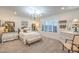 Bedroom with plantation shutters, crystal chandelier and coordinated vintage style furniture at 10140 Magnolia Creek St, Las Vegas, NV 89141