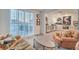 Comfortable sitting room with plantation shutters, classic furniture, and bright, neutral colors at 10140 Magnolia Creek St, Las Vegas, NV 89141
